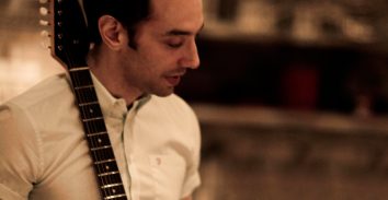 artist, Albert Hammond, holding electric guitar